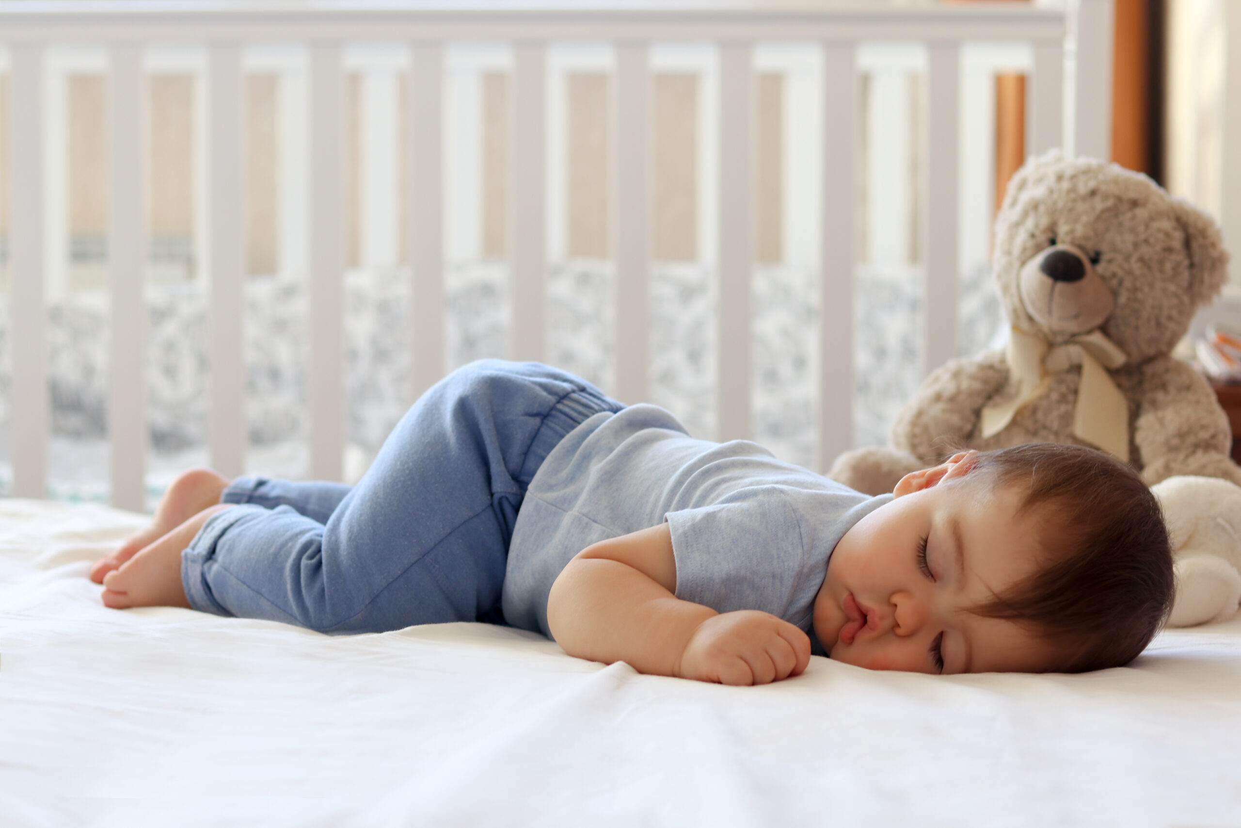 Sleepy kid with stuffie